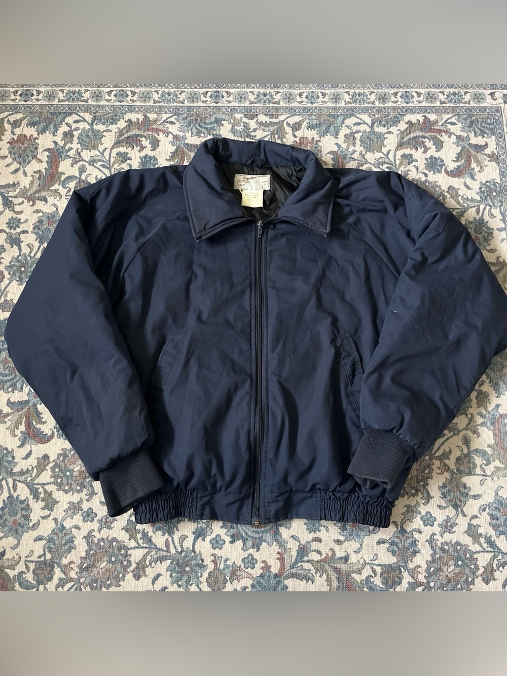 Vintage 1990s navy blue bomber jacket
